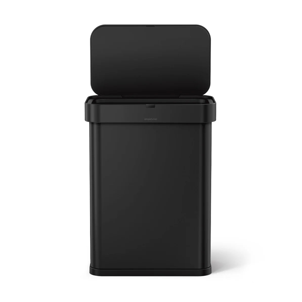 The image shows a Simplehuman trash can with a matte black finish, viewed from the front with the lid open. The trash can has a sleek, rectangular design with slightly rounded corners, giving it a modern and minimalist appearance. The open lid reveals the interior of the can, which is designed for easy disposal of waste. The matte black finish adds a sophisticated and contemporary touch, making the trash can a stylish addition to any kitchen, bathroom, or office space. The design emphasizes both functionali