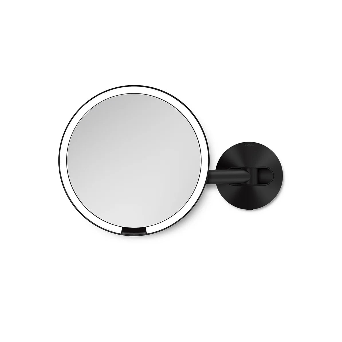 The image shows a round wall-mounted mirror with a sleek design featuring a polished black frame. The mirror is attached to a black adjustable arm and mount, providing both functionality and a modern aesthetic. The minimalist design makes it a stylish addition to any bathroom or vanity area. The adjustable arm allows for easy positioning, making it ideal for grooming, makeup application, or close-up tasks. The black finish adds a contemporary and elegant touch to the overall design.