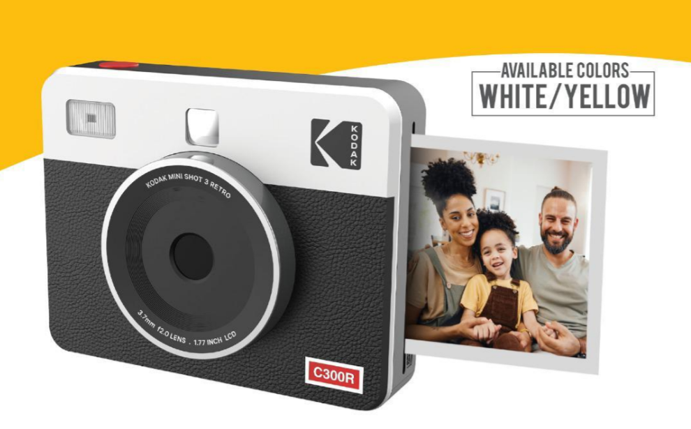 Kodak Mini Shot 3 Retro C300R instant camera with a black and white vintage design, featuring a built-in printer. A printed photo of a smiling family is emerging from the camera. Available in white and yellow color options.