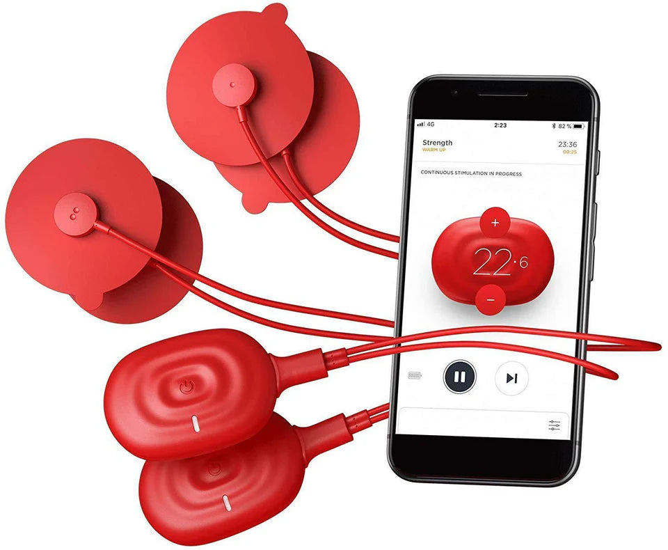 Red muscle stimulation pads connected to a smartphone app interface, demonstrating adjustable intensity settings and seamless connectivity for personalized recovery and muscle therapy.