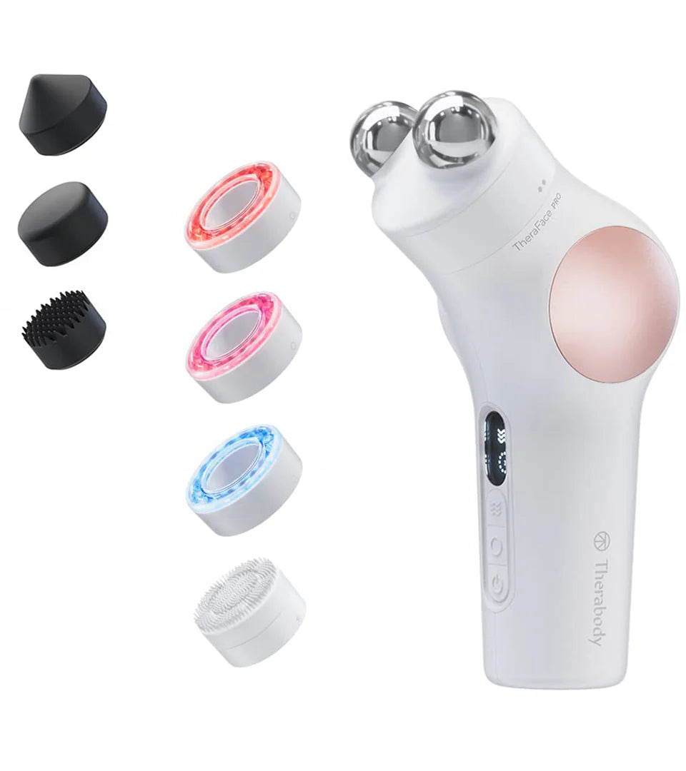 TheraFace Pro device with multiple attachments, including microcurrent rings, LED therapy rings (red, blue, and infrared), percussive therapy heads, and a cleansing ring, designed for comprehensive facial care and skin rejuvenation.