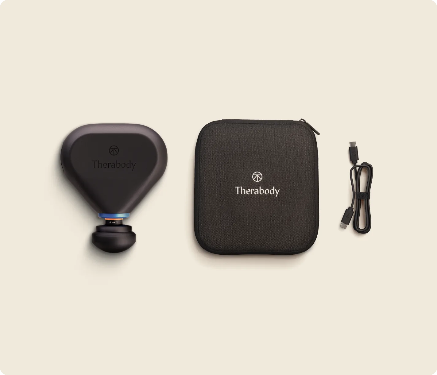 Therabody Theragun Mini Plus box contents: device, heated attachment, USB-C cable, travel pouch