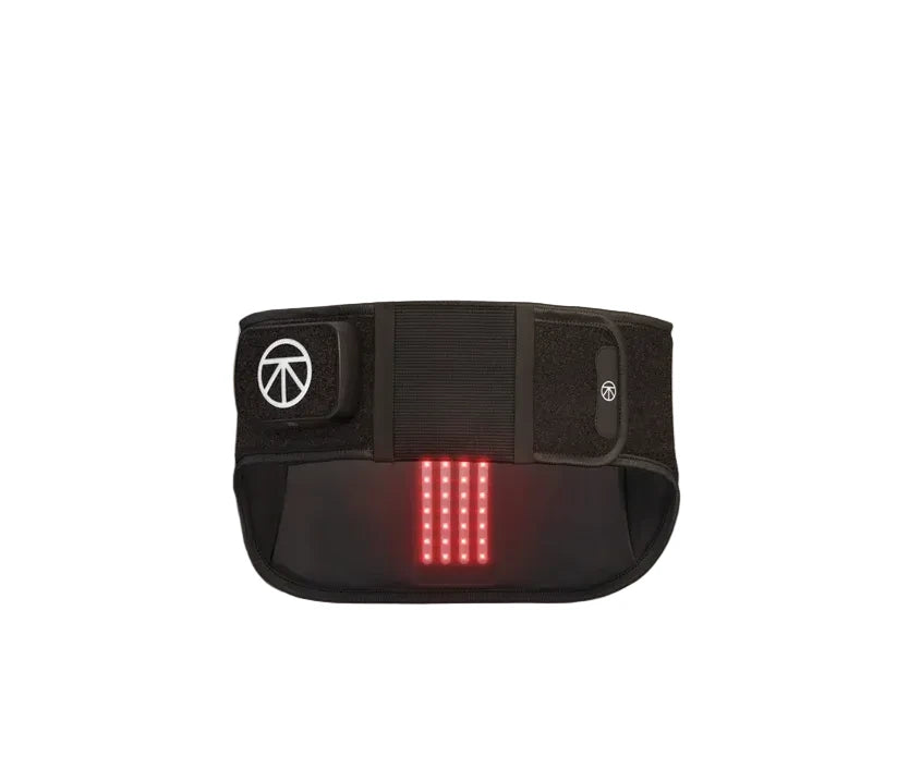 Black waist support belt with red LED lights on a beige background