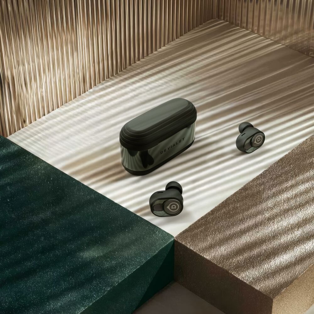 Devialet Gemini II Deep Forest earbuds and charging case