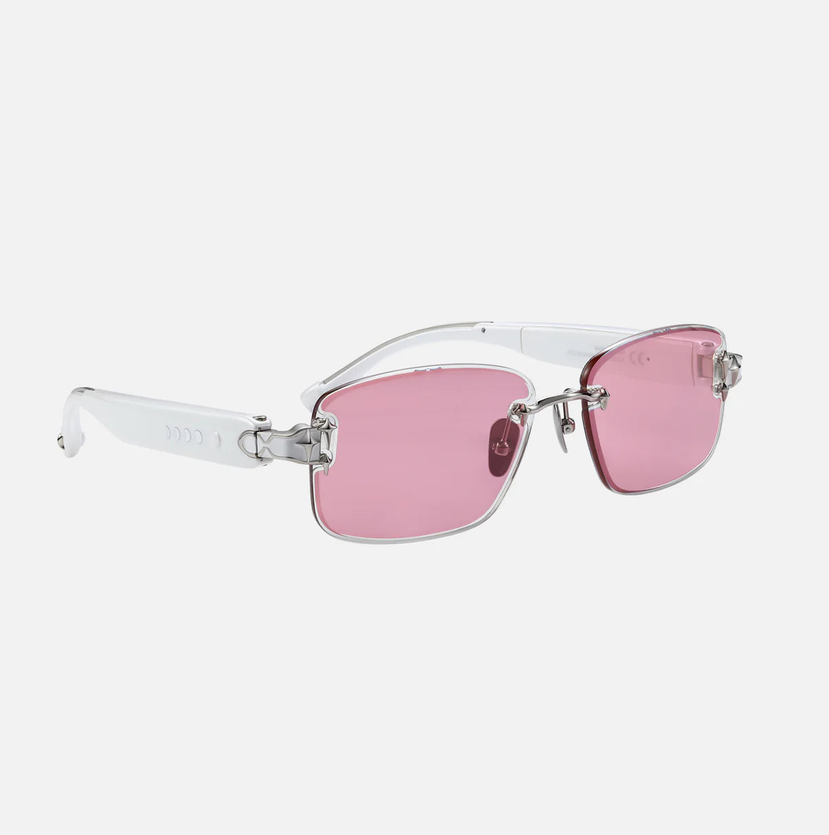 Chamelo Eyewear features a sleek design with pink-tinted lenses and a lightweight, durable white frame.