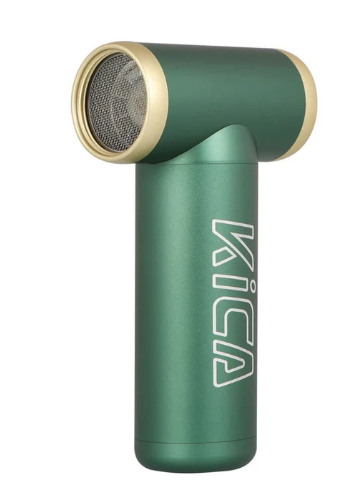  The image shows a KICA Jet Fan 2 in a green color with gold accents. The fan has a T-shaped design with a cylindrical fan unit at the top and a handle below. The brand name "KICA" is printed vertically on the side of the handle in white text. The green and gold color combination gives the fan a stylish and modern appearance, emphasizing its portability and functionality.