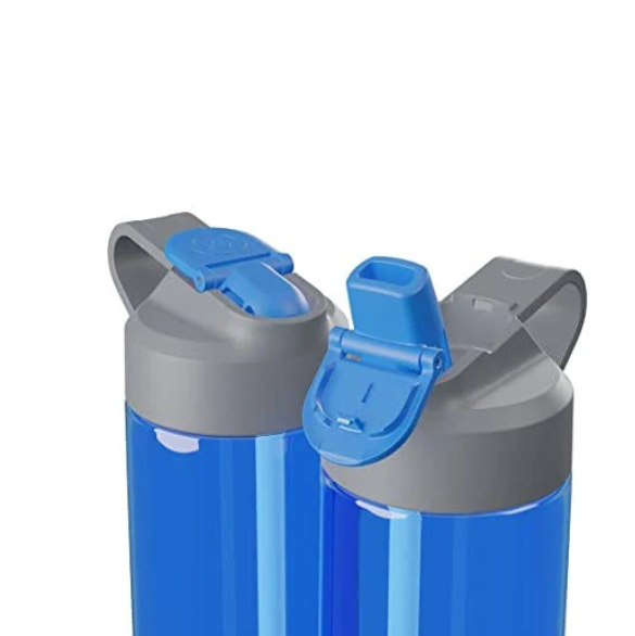 The image shows a close-up of two blue HidrateSpark water bottles with grey lids. One bottle has the spout open, while the other has the spout closed, both featuring a convenient flip-top design for easy drinking. The grey lids are designed with a carry loop for portability, making these bottles suitable for active users who want to track their hydration. The clean design and smart hydration technology make them ideal for health-conscious consumers.