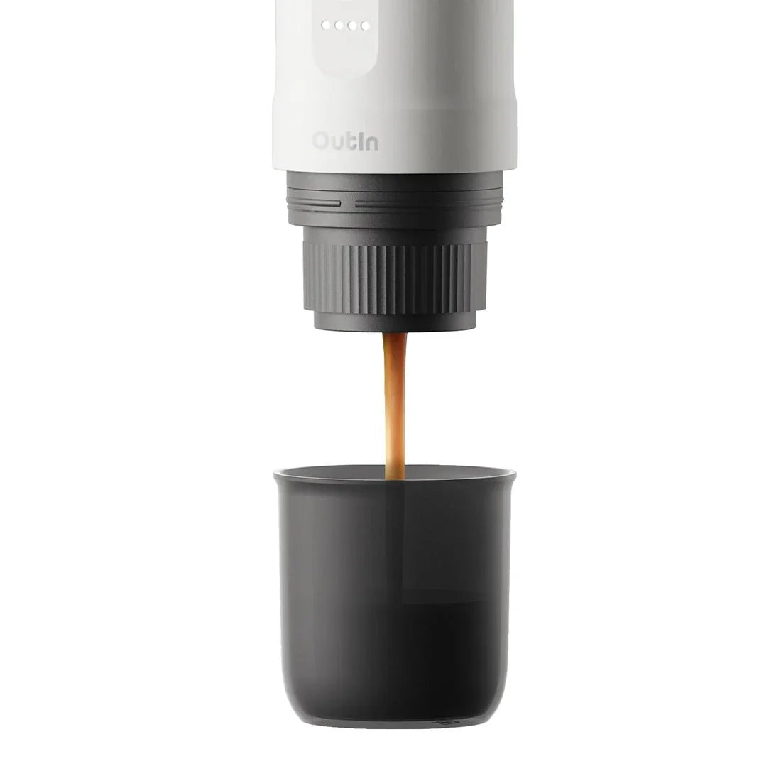 OutIn Nano Pearl White extracting espresso with crema into cup