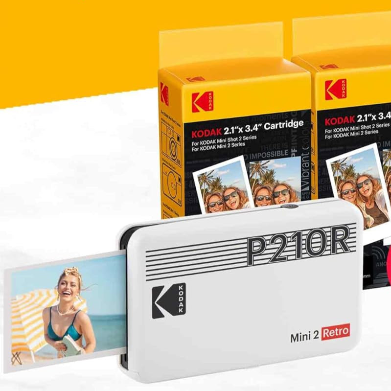 This image displays the Kodak Mini 2 Retro portable photo printer alongside its compatible 2.1"x3.4" cartridges, emphasizing its sleek design and high-quality instant photo printing capability.