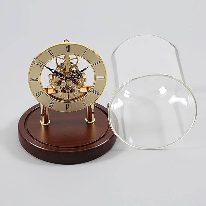 Elegant skeleton clock with Roman numerals and visible inner gears, mounted on a polished wooden base. The clear glass dome cover is placed beside the clock, showcasing the delicate craftsmanship and adding a touch of sophistication to the design.