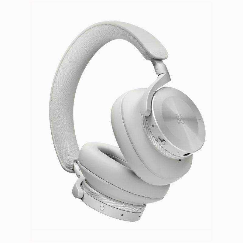 B&O premium wireless over-ear headphones with aluminum accents and cushioned ear pads, designed for high-quality audio performance and comfort.